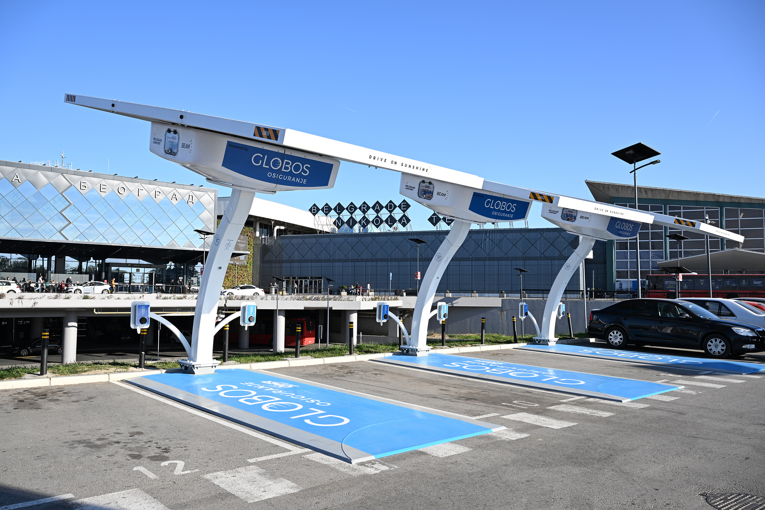 EV ARC™ solar-powered EV charging stations are now deployed at Belgrade Nikola Tesla Airport, Serbia's busiest international travel hub, and will provide free public electric vehicle charging and a long-term recurring revenue stream for Beam Global