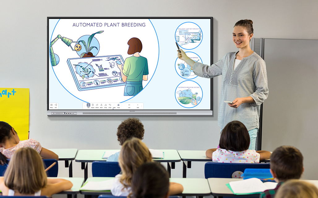 A teacher uses the Network Board to instruct students in the classroom.