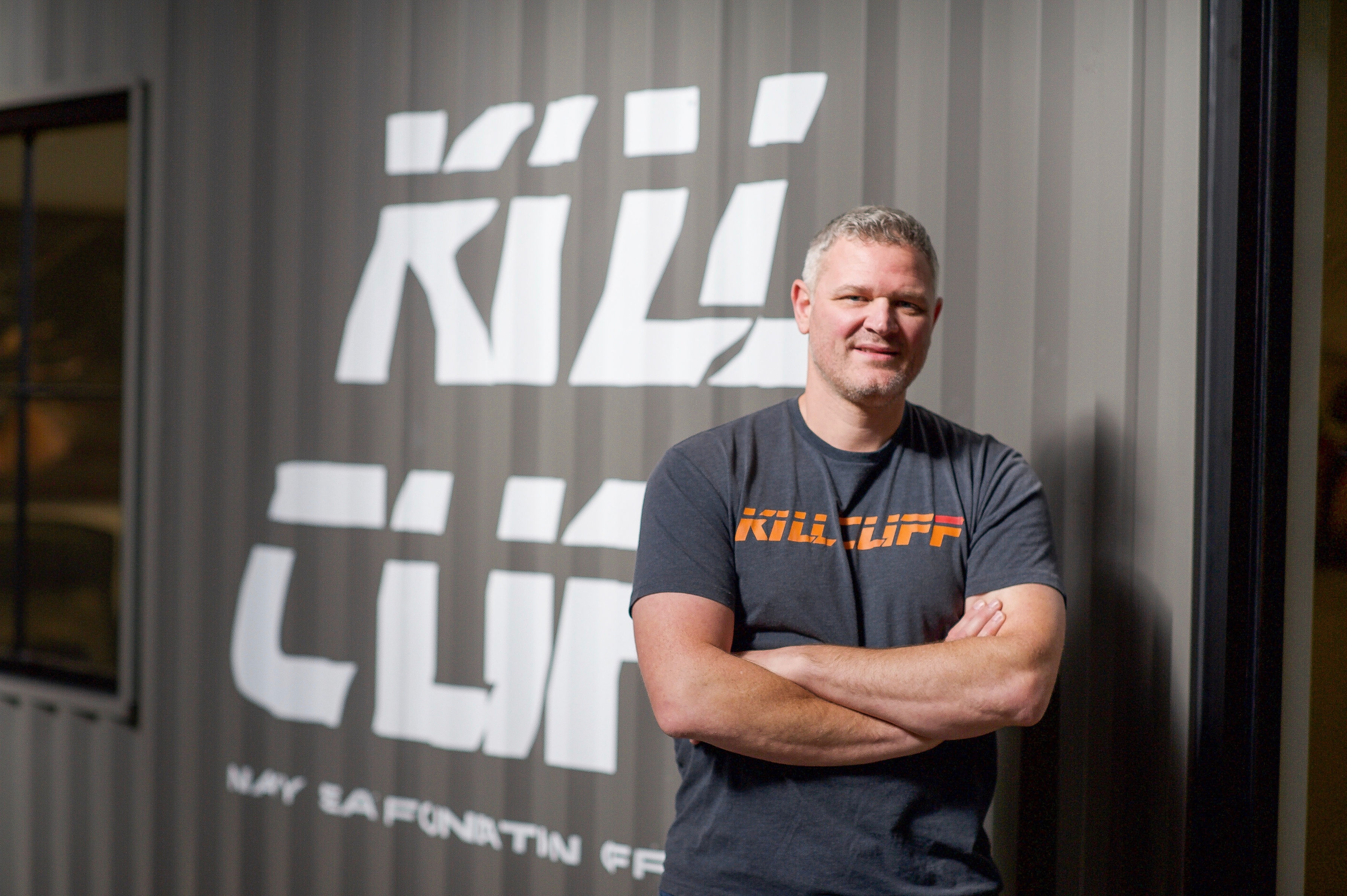 Photo of John Timar in a Kill Cliff shirt.