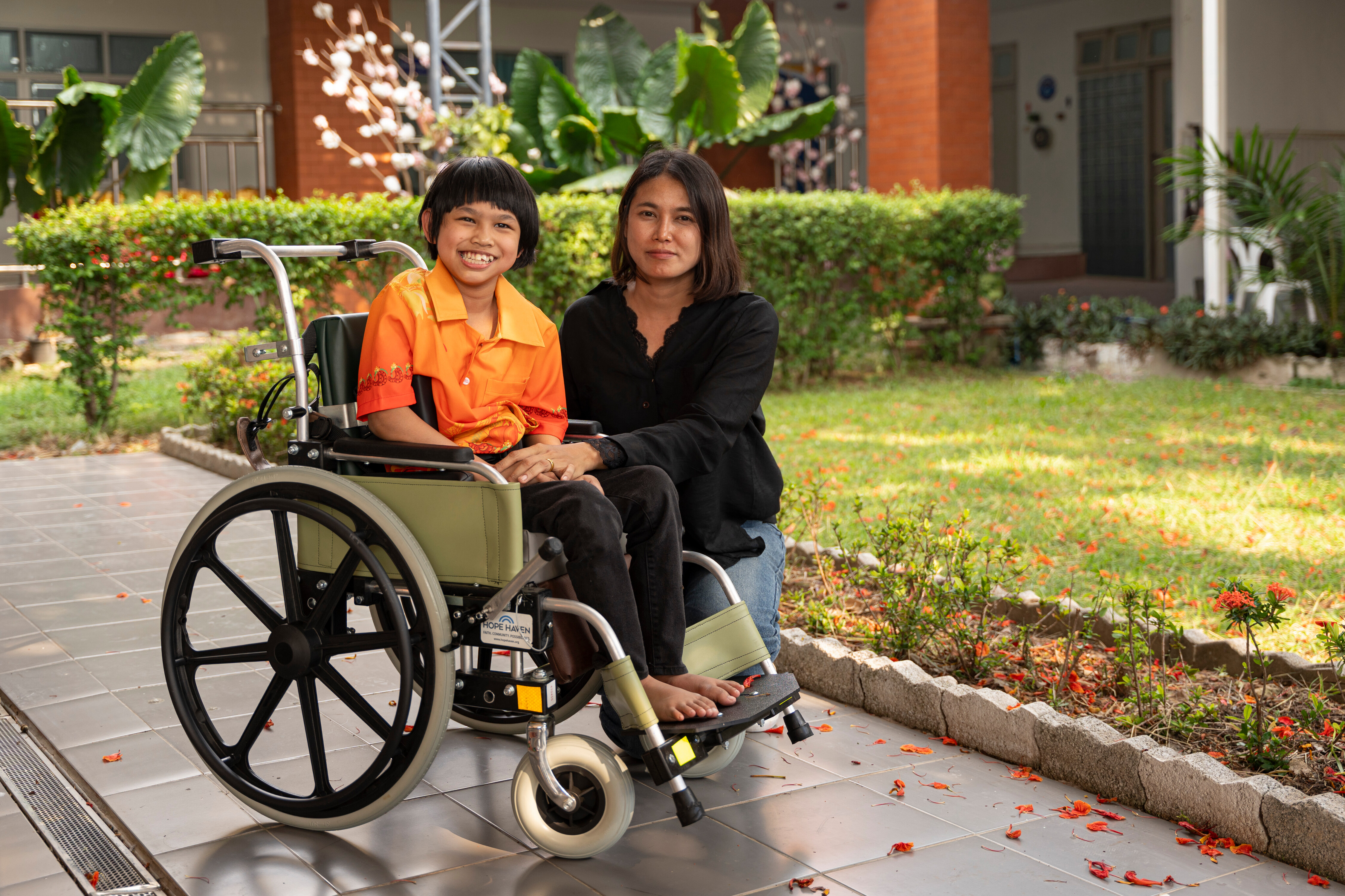 Mim, a single mother of three, carried Nada everywhere for the first 11 years of Nada's life. This wheelchair gives both of them freedom and dignity.