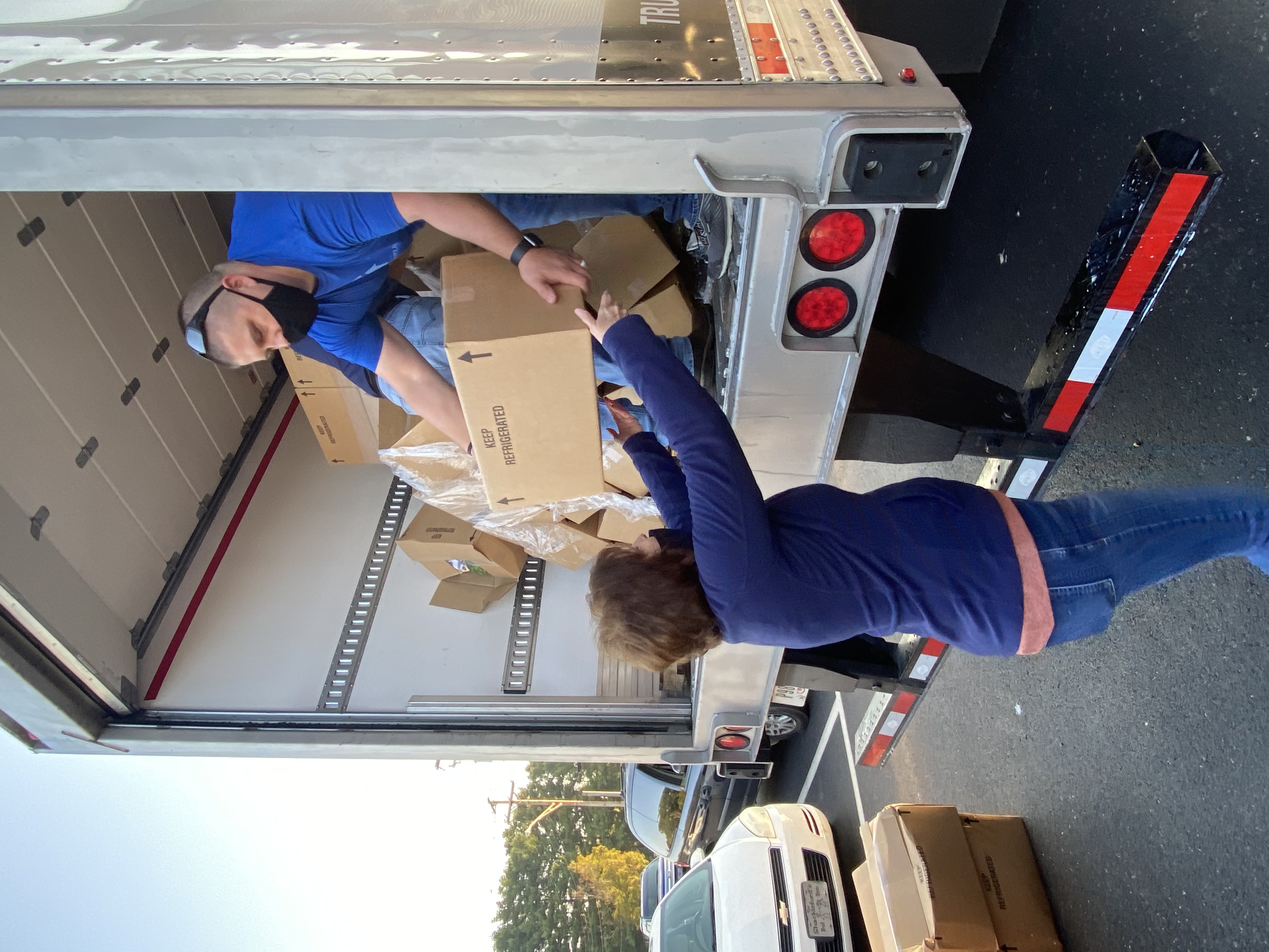 Sherri Barnett, manager of Christian Appalachian Project's Grateful Bread Food Pantry, helps distribute food boxes in Rockcastle County, Kentucky.