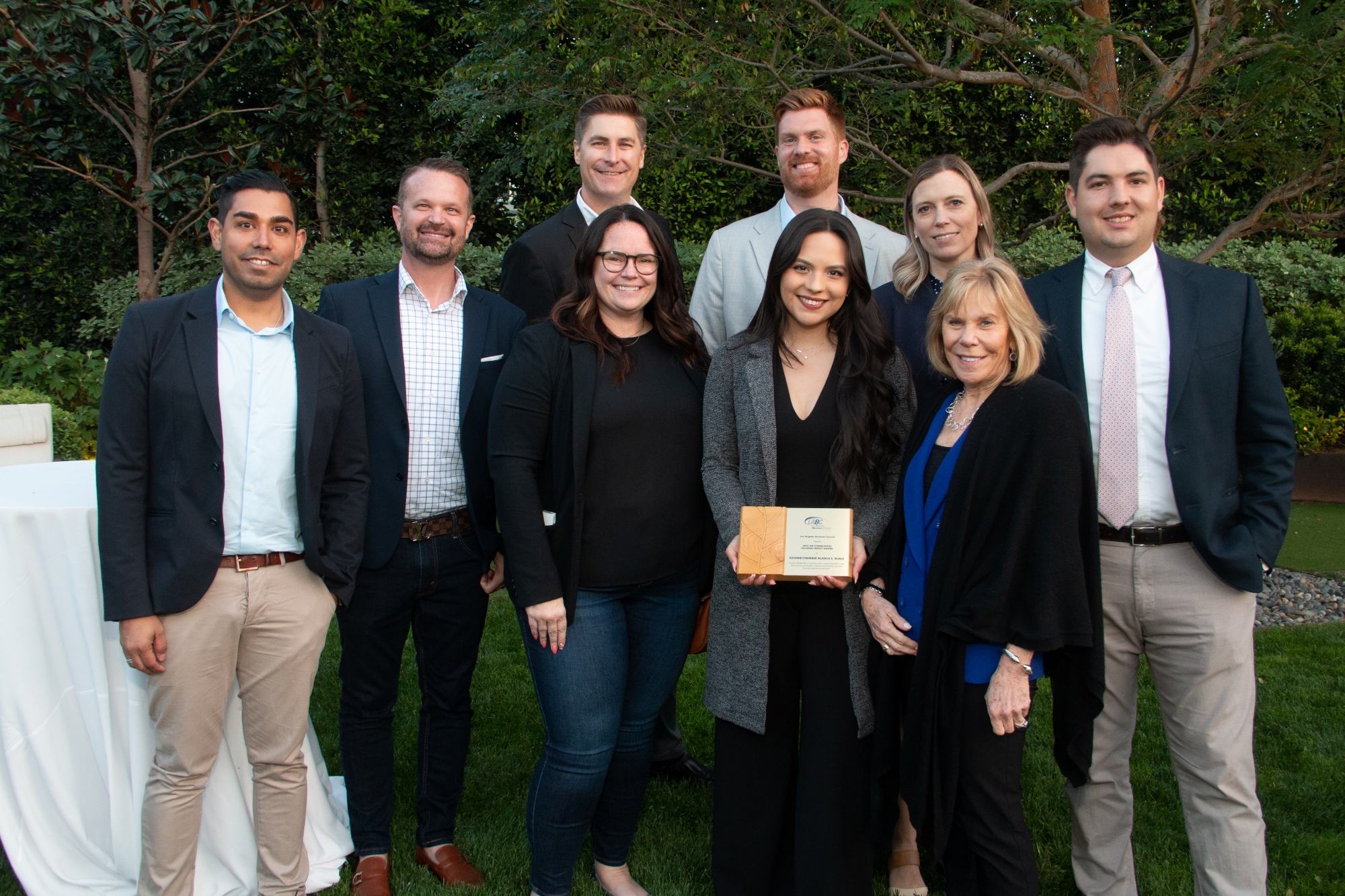 AIR teammates present the 2022 Housing Impact Award, which was accepted by Denaee Amaya, District Director for Assemblywoman Blanca Rubio.