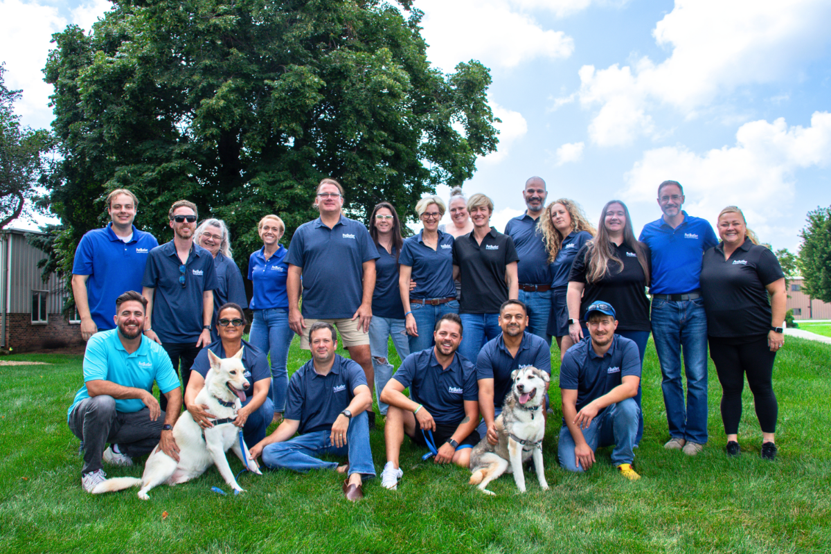 Pet Butler franchise owners and support staff pose for a group photo during Pet Care services training at the company's Plainfield, IL Support Center