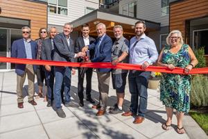 Project partners cut the ribbon at the grand opening of Uplands Terrace Apartments at 6117 Uplands Drive, Nanaimo, British Columbia.