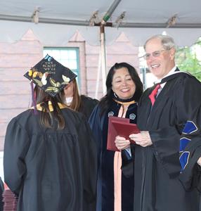 Vernon W. Hill, II & Dr. Gloria Bonilla-Santiago distributing diplomas at the LEAP Academy High School 2021 Graduation Ceremony