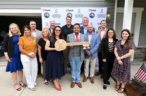 Representatives from Freedom Alliance, U.S. Bank and True Homes presented the keys to a newly built mortgage-free home to U.S. Army Private Second Class Roy Garcia and his family during a ceremony Tuesday, August 29, 2023, in Monroe, North Carolina.
