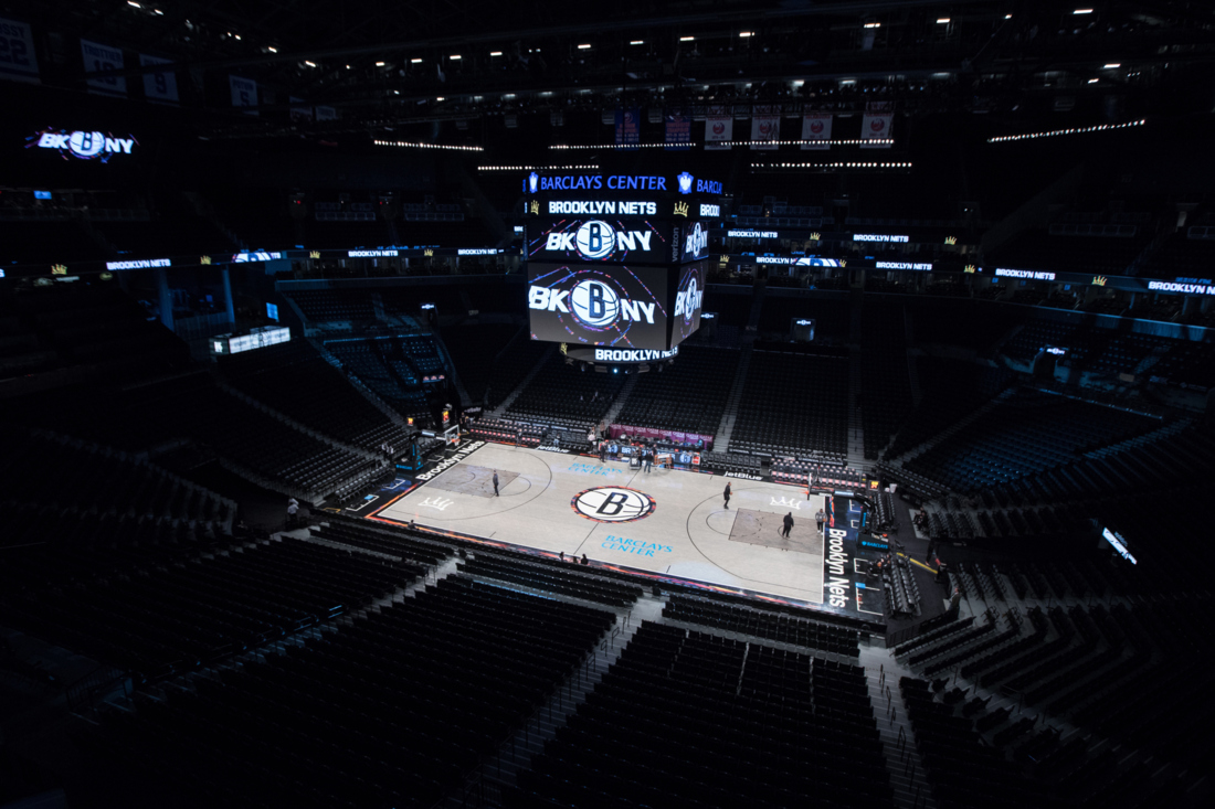 Barclay Center, home of the Brooklyn Nets, basketball floor finished with Bona. 