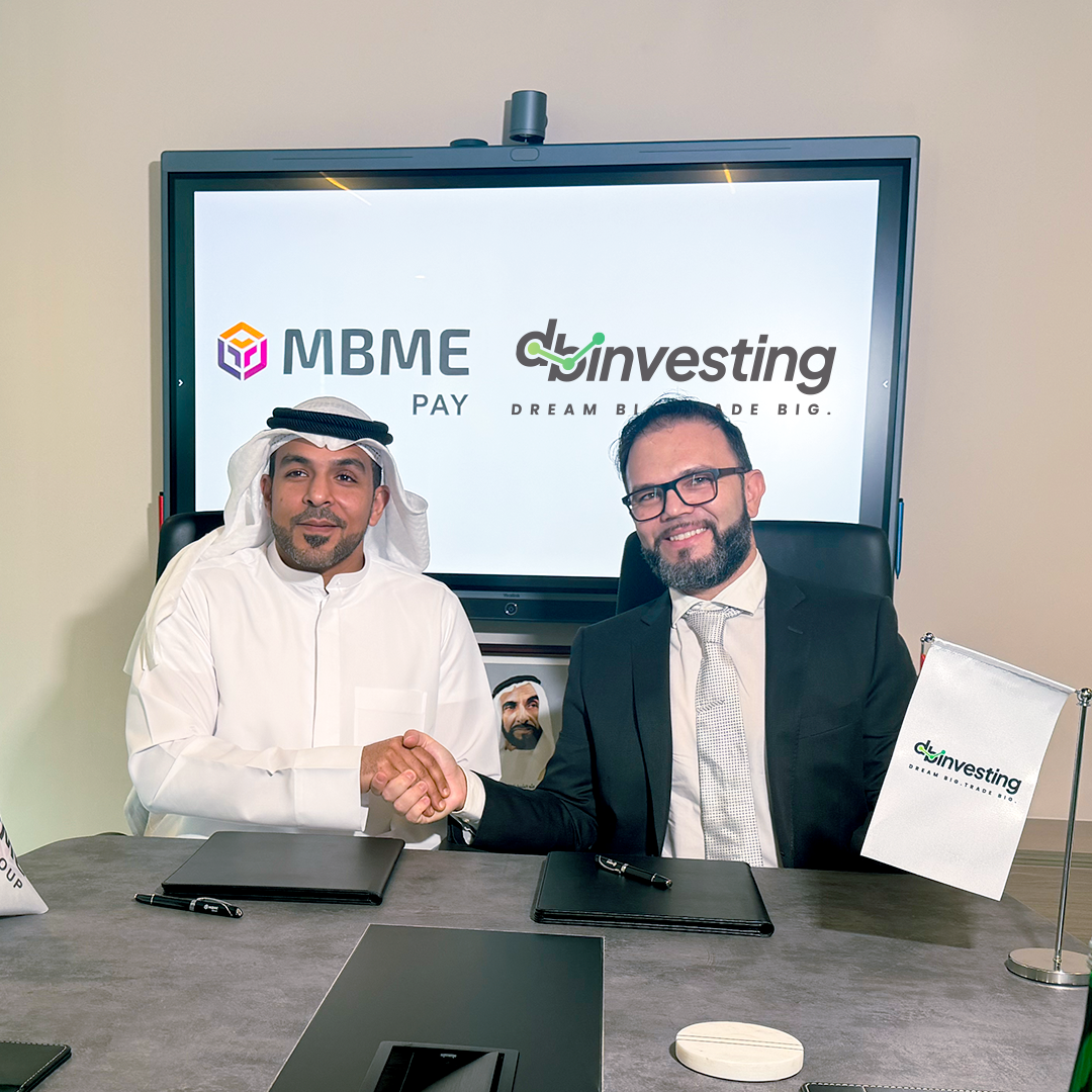 Leadership team from DB Investing and MBME Pay in a formal meeting photo