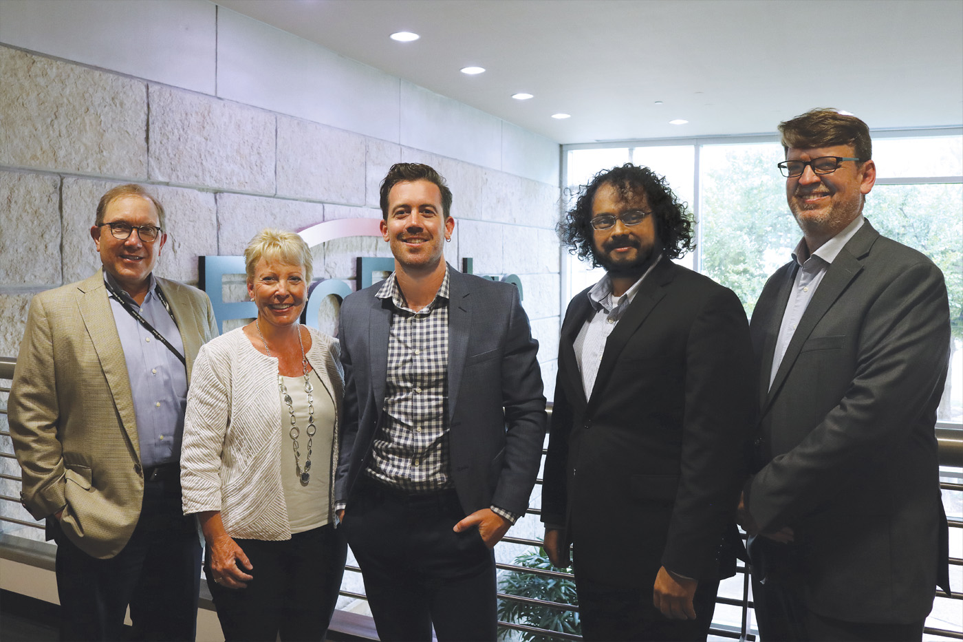 Leaders from BioBridge Global, Cell Bridge Strategies and Vitrafy Life Sciences are pictured following a meeting at the BioBridge Global Headquarters Building in San Antonio, Texas. From left, Martin Landon, Chief Executive Officer, BioBridge Global; Jane Andrews PhD, Chief Executive Officer, Cell Bridge Strategies; Brent Owens, Co-Founder, Vitrafy Life Sciences; Anand Srinivasan PhD, Director, Innovation & BioDesign, BioBridge Global; and Scott Jones PhD, Vice President, Scientific Affairs, BioBridge Global.