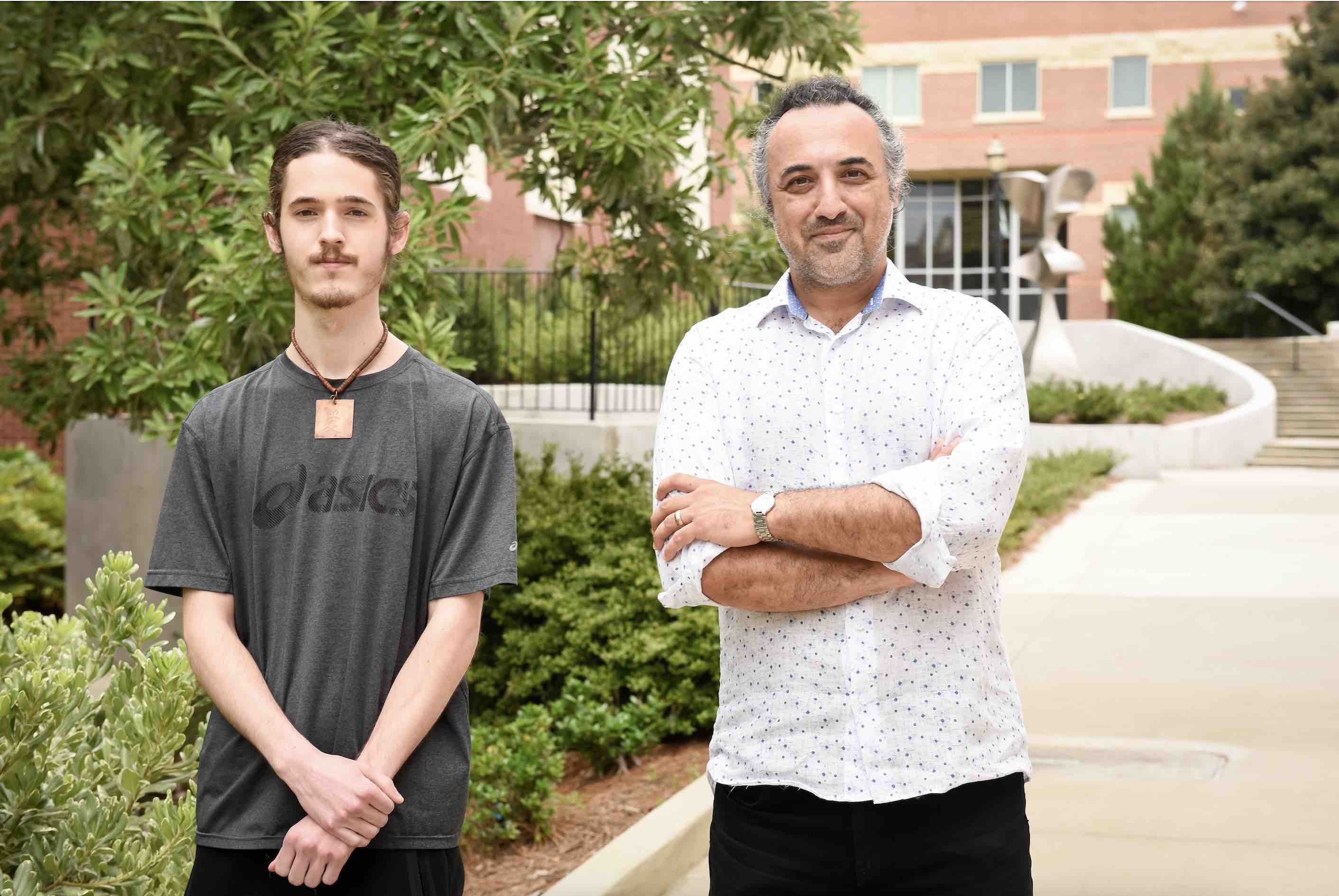 Georgia College senior physics major Cody Cox of Milledgeville and his mentor––astrophysicist Dr. Arash Bodaghee.