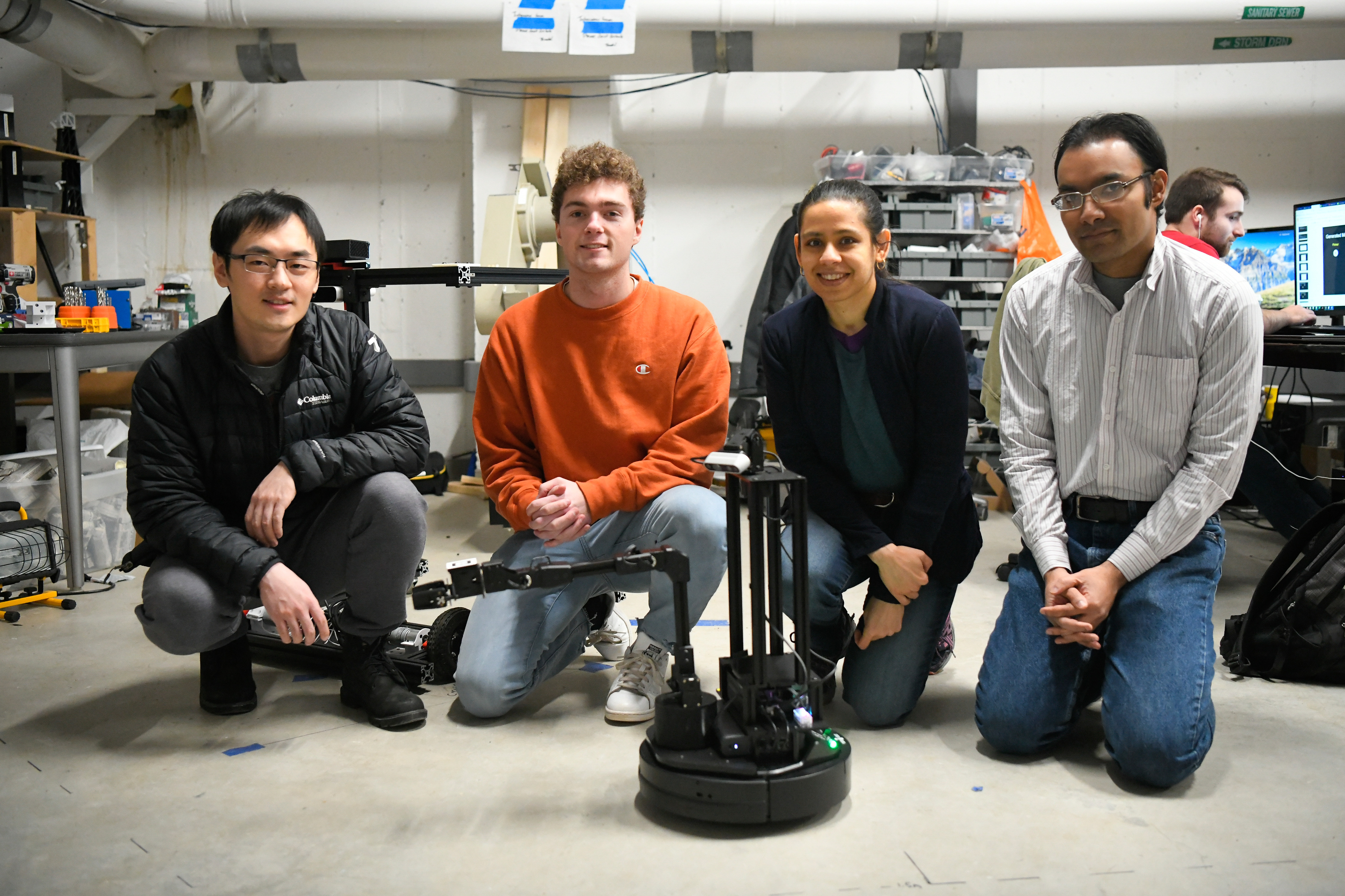 Left to right: Yijun Jiang, Graduate Student, Computer Science, Elim Schenck ‘21 Computer Science & Computer Engineering, Assistant Professors of Computer Science Natasha and Sean Banerjee