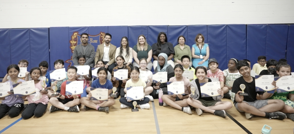 Proud Moments: Participants, School Representatives, and Cyber Square Representatives gather with beaming smiles, accompanied by the talented young coders proudly displaying their certificates and trophy, symbolizing their outstanding achievements at the 'Digital Fest'.