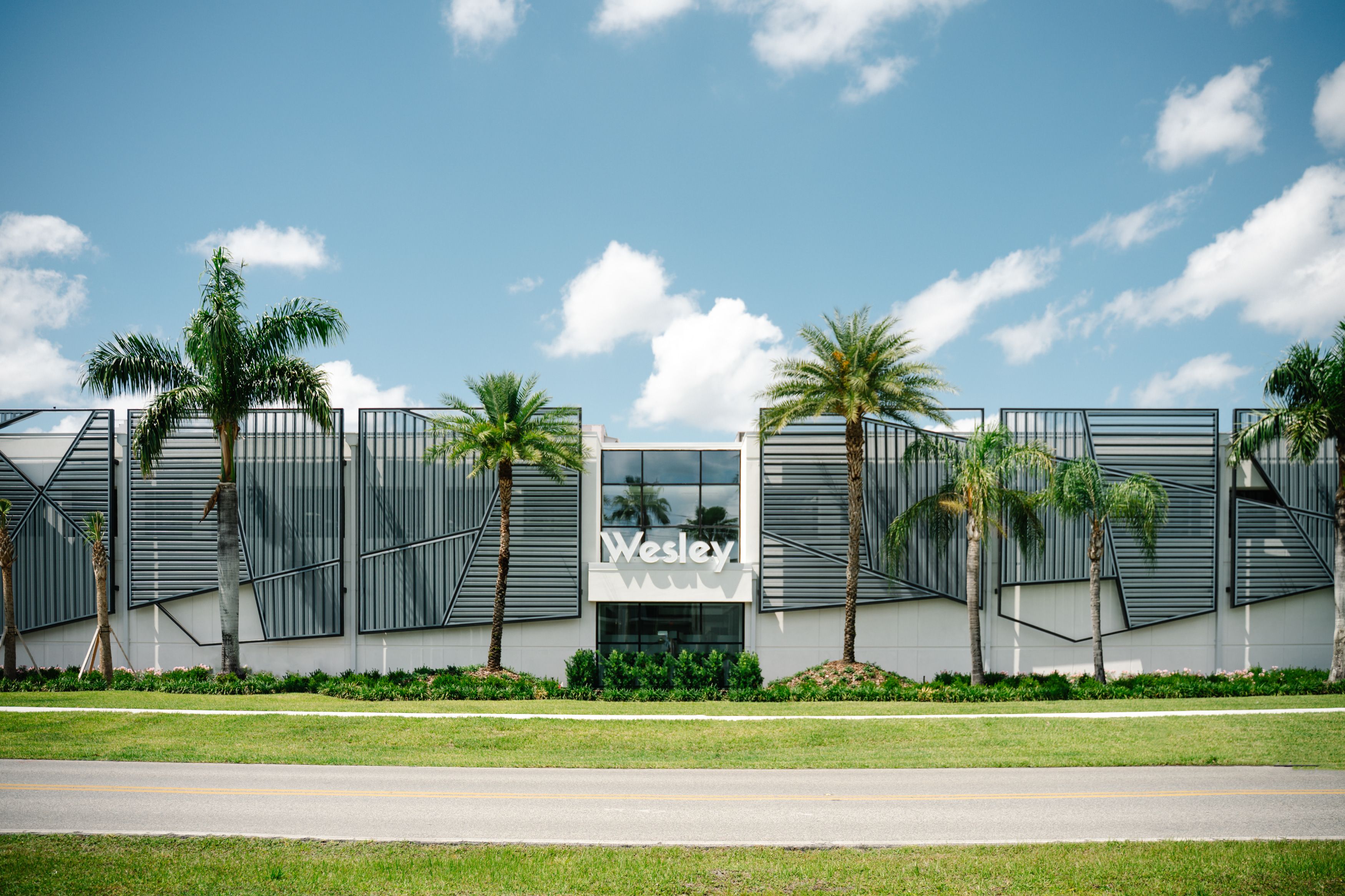 Wesley Pharmaceuticals, co-founded by Stan and Naomi Loomis, opens in Orlando with plans to hire over 100 employees.