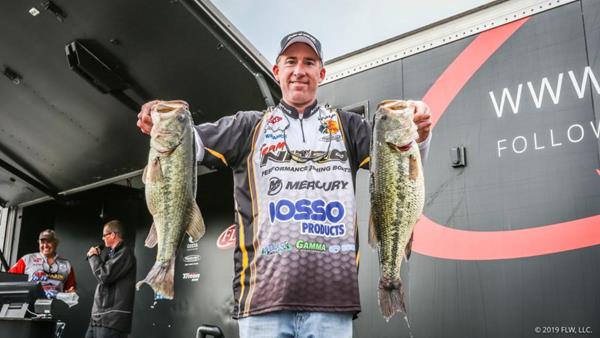 Pro Kyle Weisenburger of Ottawa, Ohio, caught a five-bass limit weighing 24 pounds, 12 ounces to take the lead Thursday at the opening day of the FLW Tour at the Grand Lake presented by Mercury Marine. 