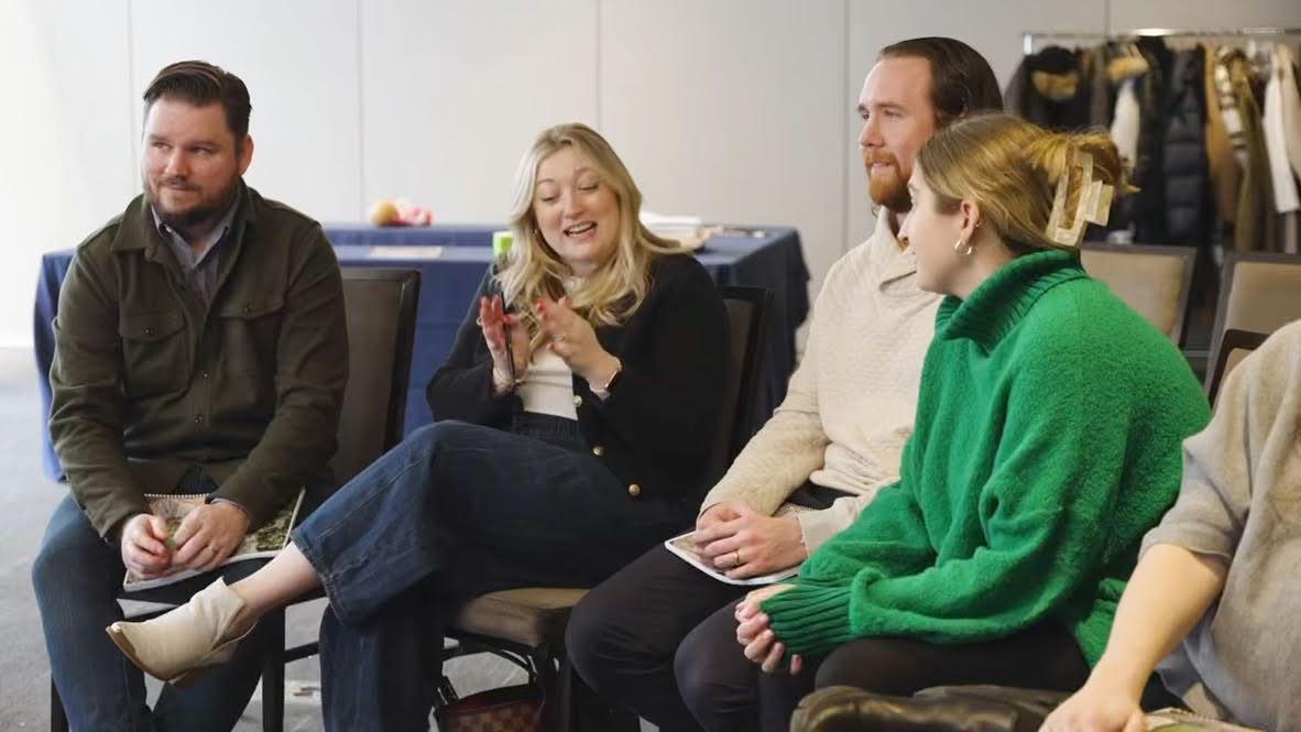 Group of expectant parents sitting in a circle during an Expecting Together prenatal class in Chicago, sharing experiences and building community.