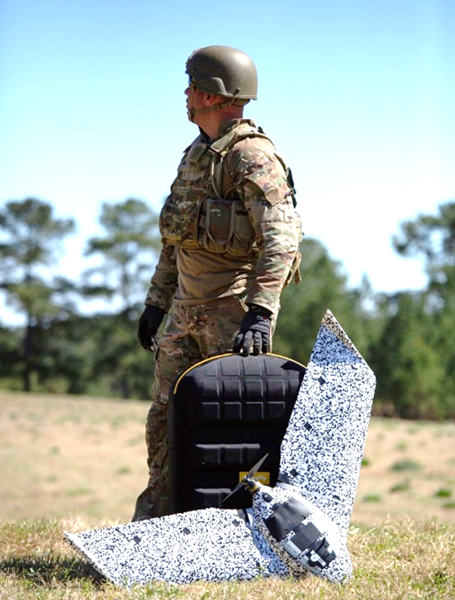 Military serviceman preparing to launch senseFly’s eBee TAC  in active flight demo