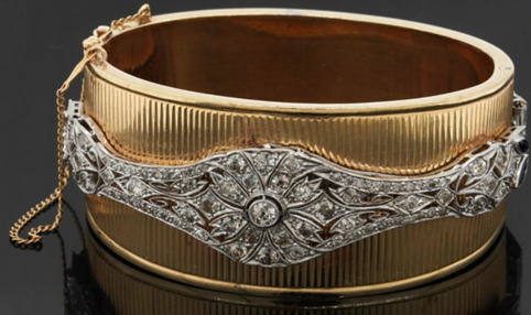 Vintage heavy 14K/Platinum 5.0CT diamond and sapphire filigree cuff bracelet. Sold for $4,549