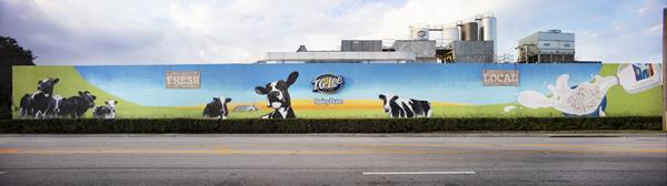 The completed mural spans more than 200 feet across T.G. Lee Dairy's facility in Orlando's Milk District. 