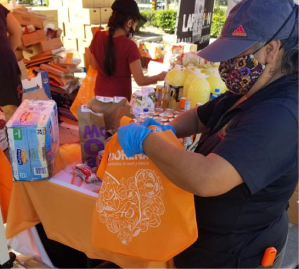 La Morena gives back to those in need by donating food to people in the community.