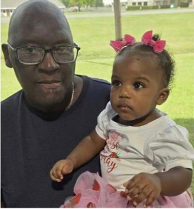 Charlie Hunter with his granddaughter: Family Photo