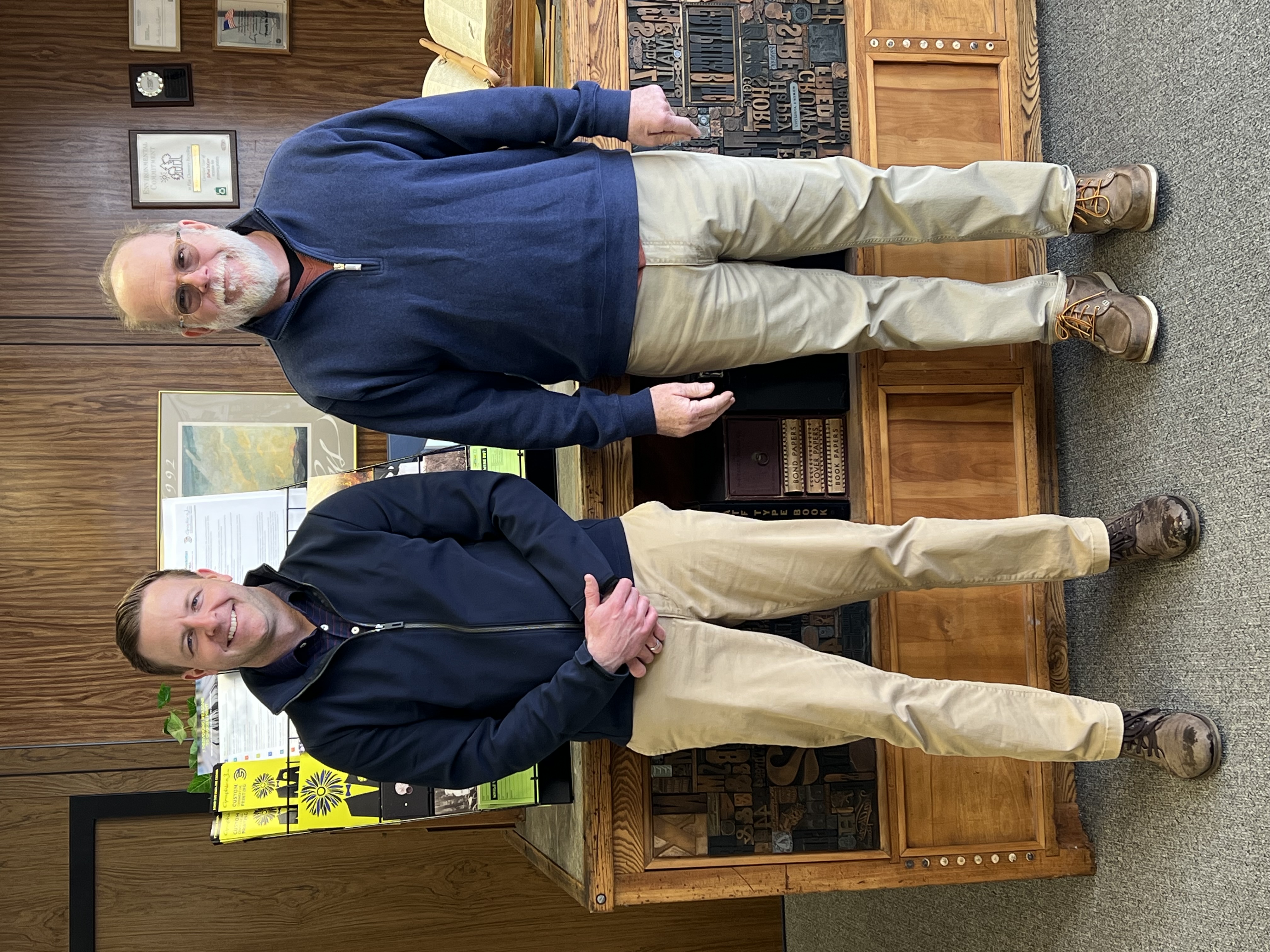 New Minuteman Press Franchise Owner Tyler Griffith (left) has purchased 49-year business Graphics 3 from Mike Iveson (right). Moving forward, the business is operating as Minuteman Press in Coldwater, MI.