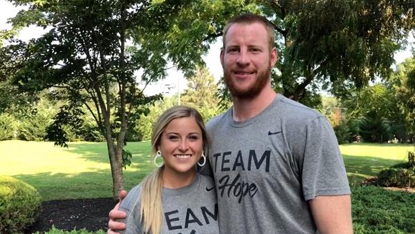 Carson Wentz, quarterback for the Philadelphia Eagles, and his wife, Madison, are the most recent team members to become a part of Team Hope.