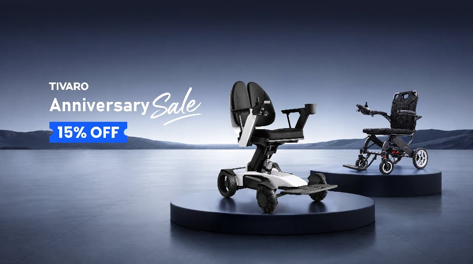 Tivaro Anniversary Sale graphic featuring EW8001 Pro and EW5004 electric wheelchairs on display platforms with 15% off