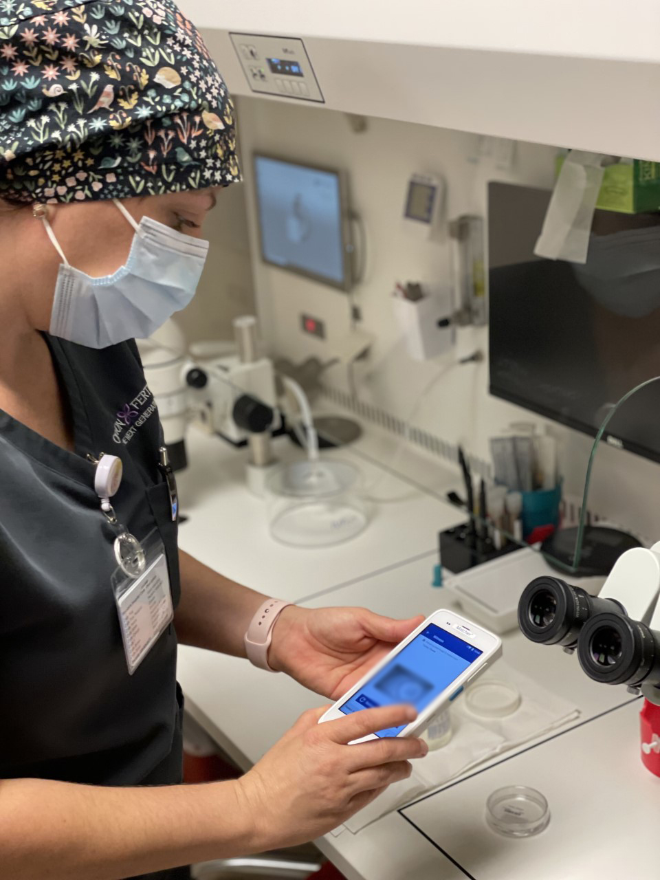Tricia Adams, senior embryologist, completes a chain-of-custody process by scanning a patient-specific barcode on a dish using the Matcher electronic witnessing system at Ovation Fertility Baton Rouge.