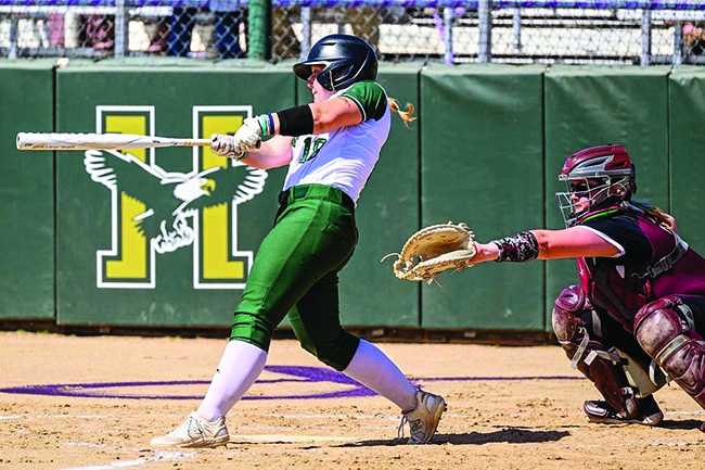 Husson's Kenzie Dore at Bat