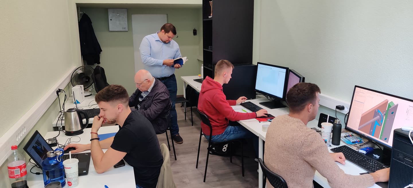 Algimantas Navaslauskas age 68 working with his fellow colleagues at KamadoSpace engineering department