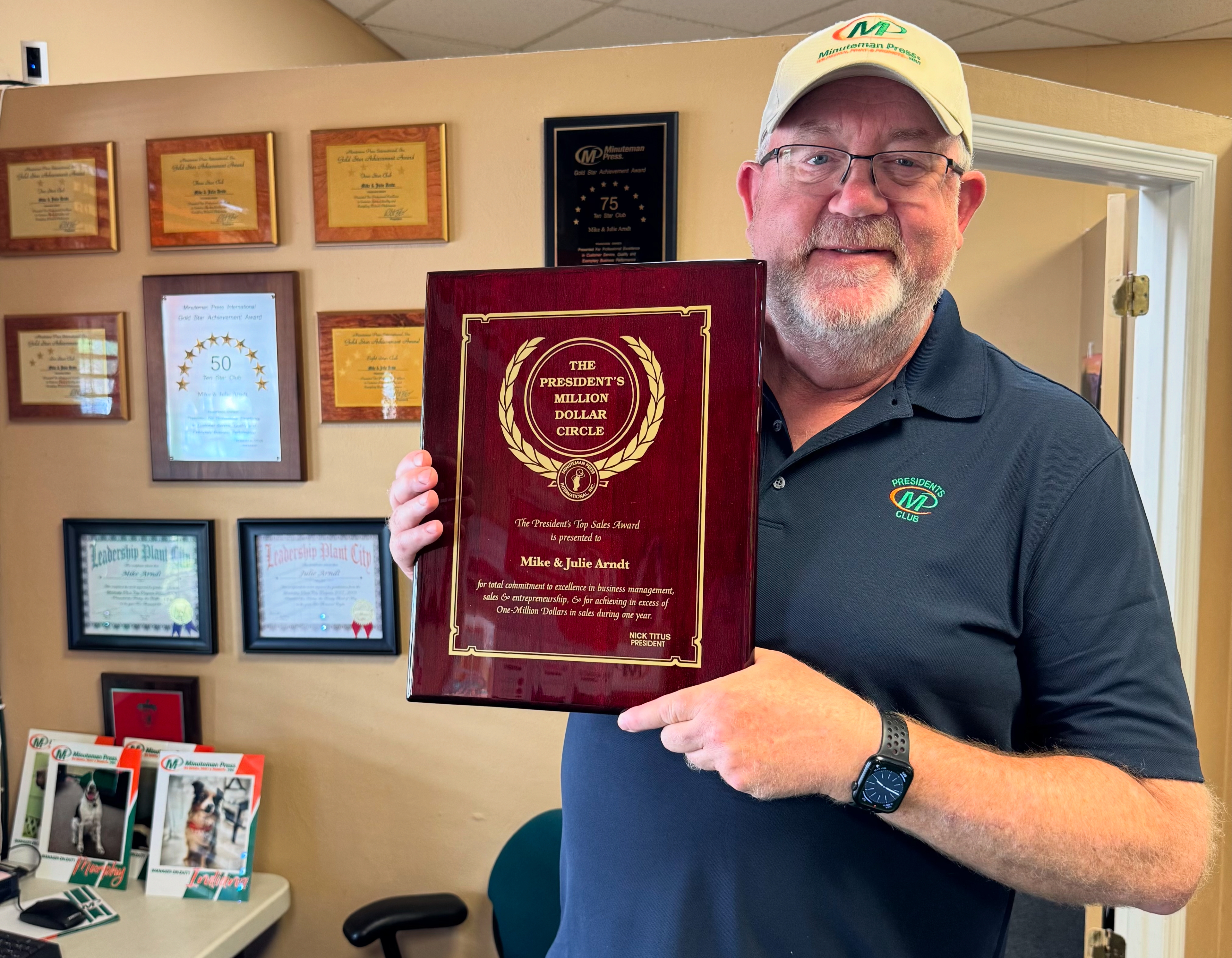 Minuteman Press Franchise Owner Mike Arndt with his well-earned President’s Club Award in Plant City, FL.