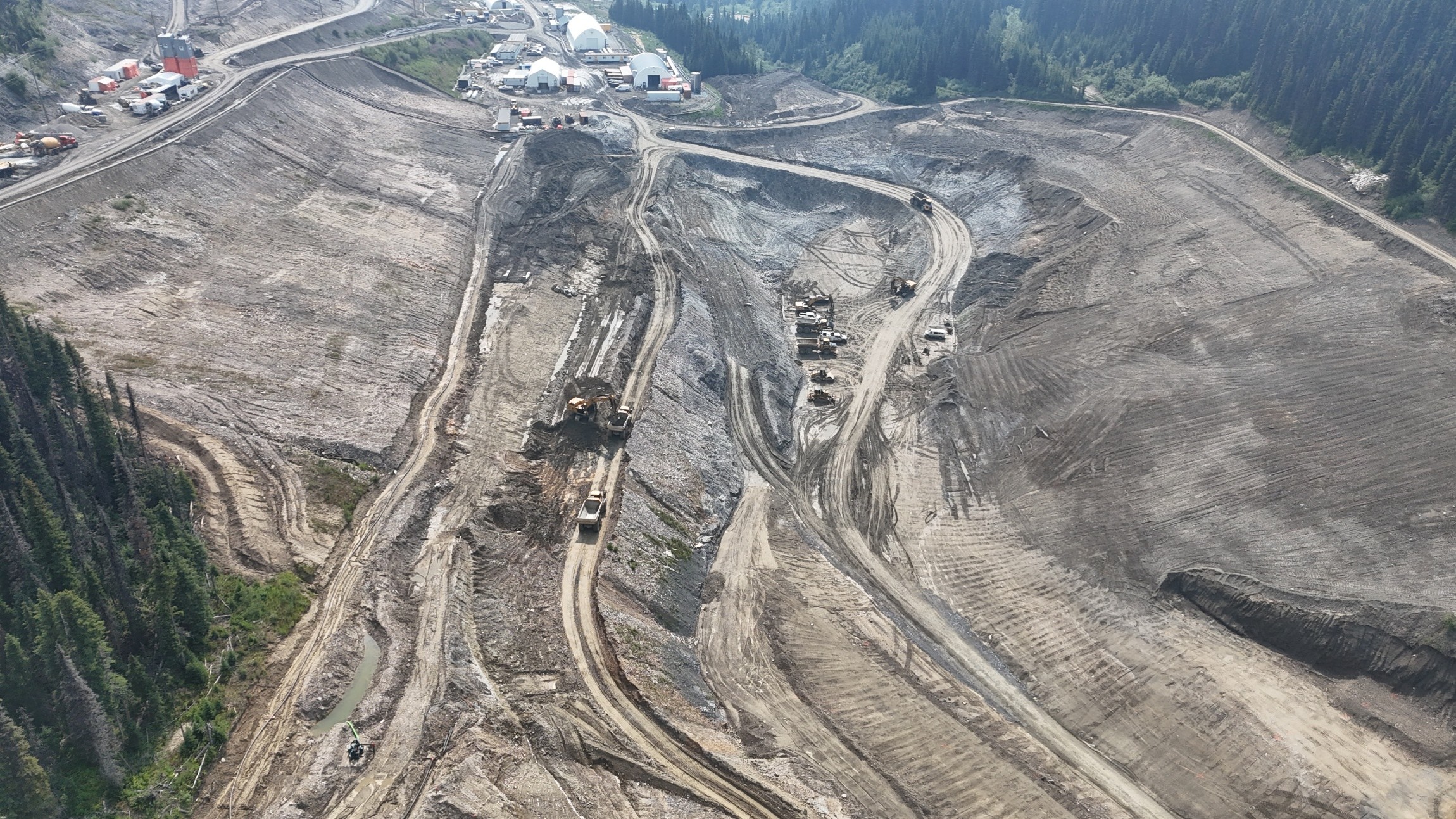 Waste rock storage facility and sediment control pond.