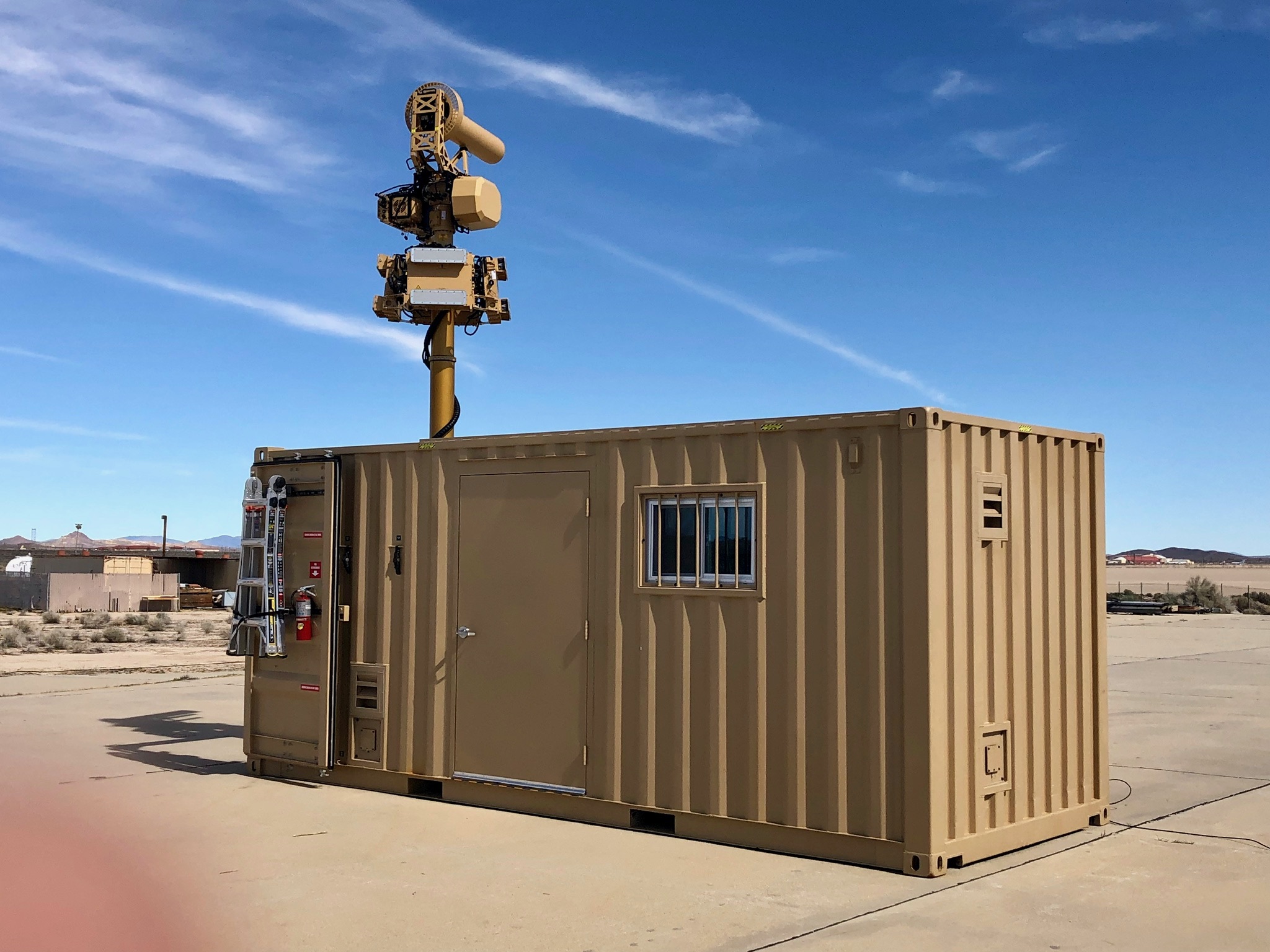 Containerized AUDS (C-AUDS) a Layered Counter UAS Solution to  Detect, Track, Identify and Defeat Malicious Threats 
