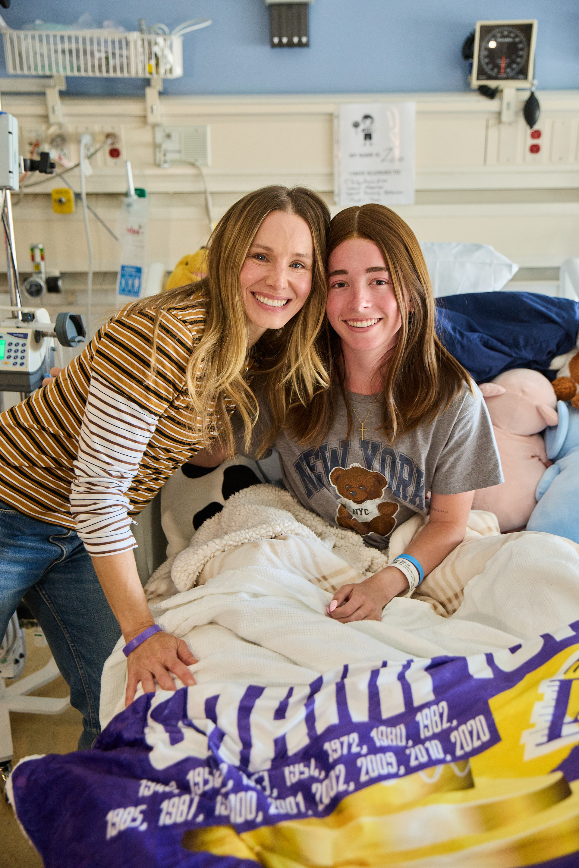 Kristen Bell visits patients' bedsides during her visit to UCLA Matel Children's Hospital with Musicians On Call and Hyundai Hope on Wheels.