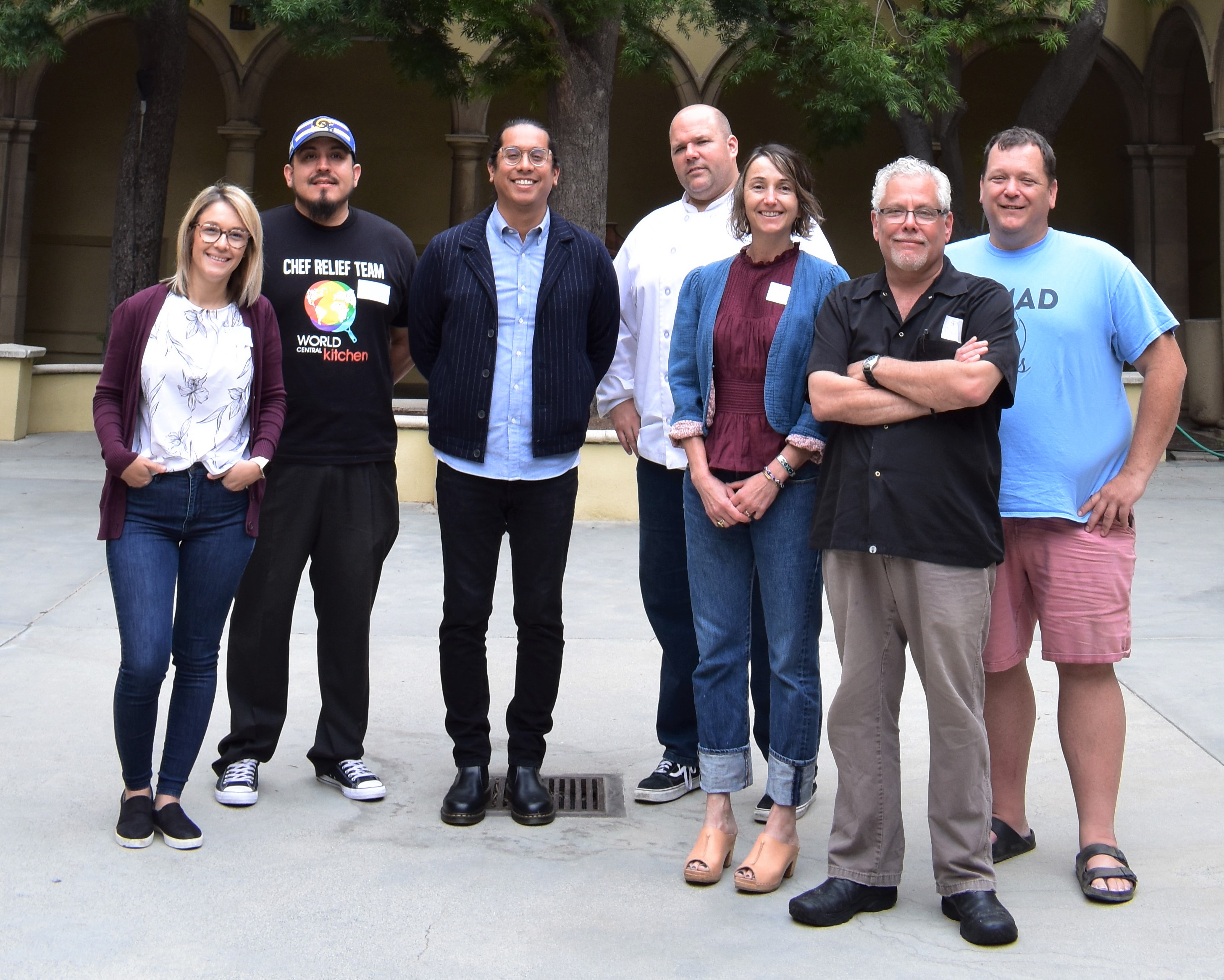 Mentor chefs pose for a photo before starting Hillsides Culinary Apprenticeship program. Left to right: Starbucks manager Christina Aguilar, chef Charlie Negrete, Starbucks manager James Valeriano, chef Doug Fore, chef Alexandra Poer, chef Claud Beltran, and Geoff Jennings of Nomad Ice Pops. Not pictured: chef Gale Kohl. 