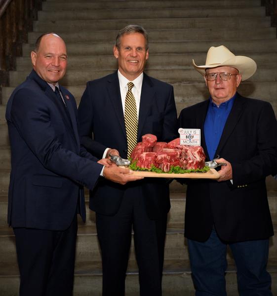 July Beef Month presentation of steaks to Governor Lee and Dr. Charlie Hatcher, Commissioner of Agriculture, with Tennessee cattle producer Gary Daniel. 