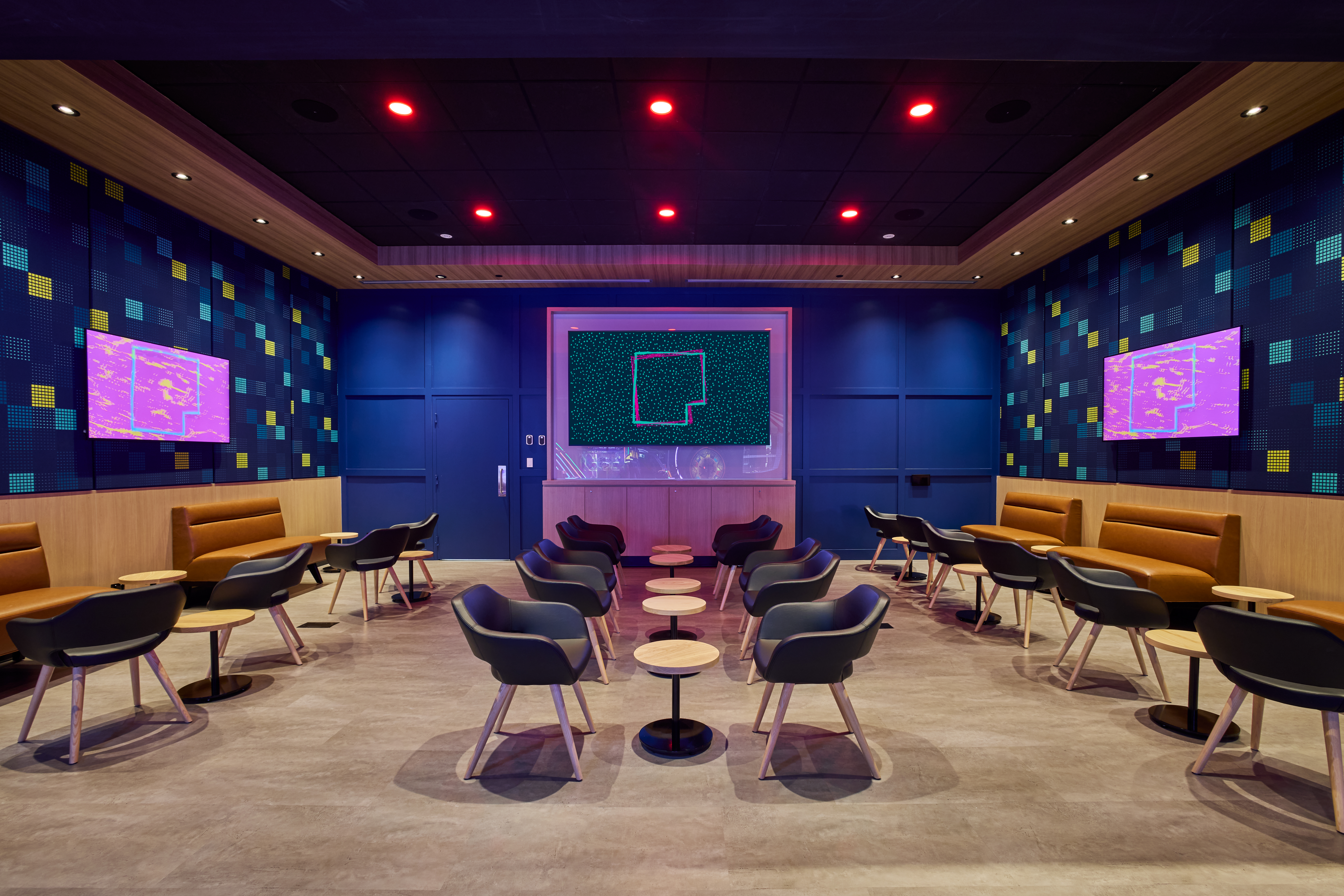 Lounge space with seating and tables for guests to sit, relax and eat
