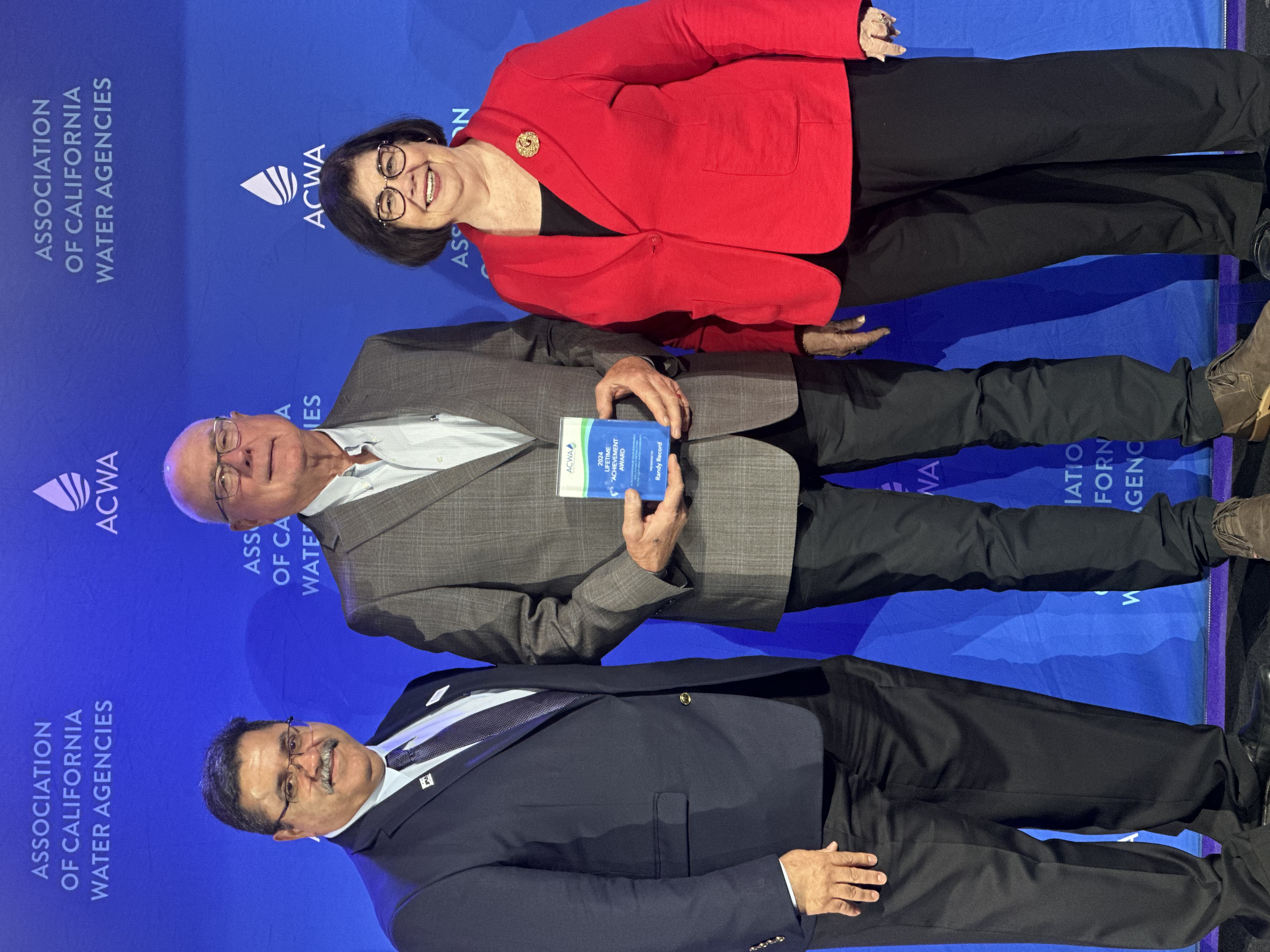 ACWA Past President Randy Record receives Lifetime Achievement Award from ACWA President Cathy Green and ACWA Vice President Ernie Avila.