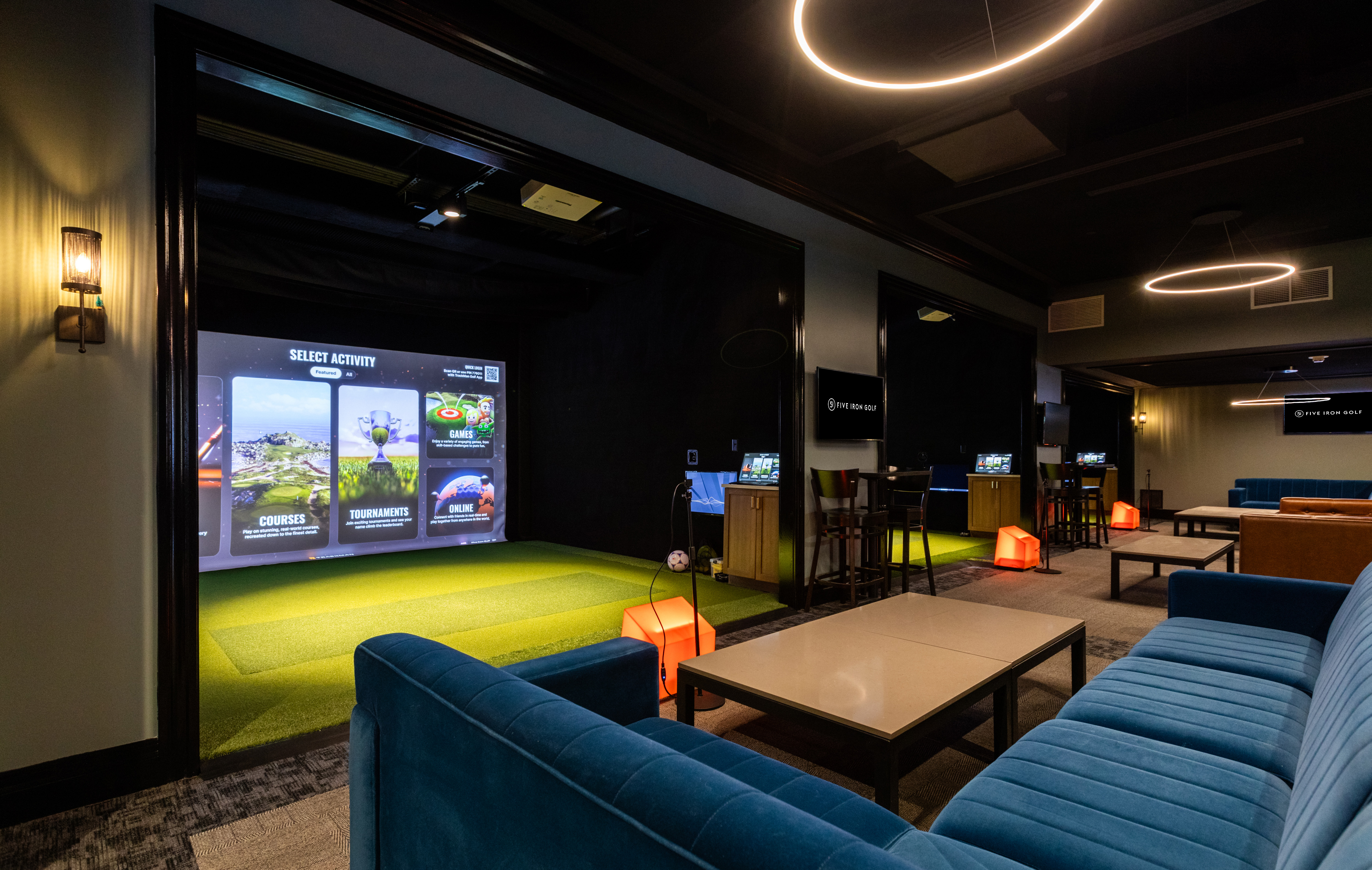 State-of-the-art Trackman simulators meet vibrant lounge spaces at Five Iron Golf Minneapolis, creating the perfect setting for practice, play, or friendly competition.