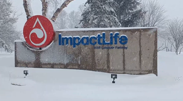 Sign at ImpactLife headquarters 