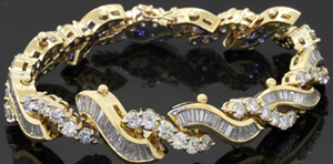 Heavy 18K gold extraordinary 20.72CTW VS1/F diamond cluster link bracelet. Sold for $11,761 at last week’s SFLMaven Famous Thursday Night Auction