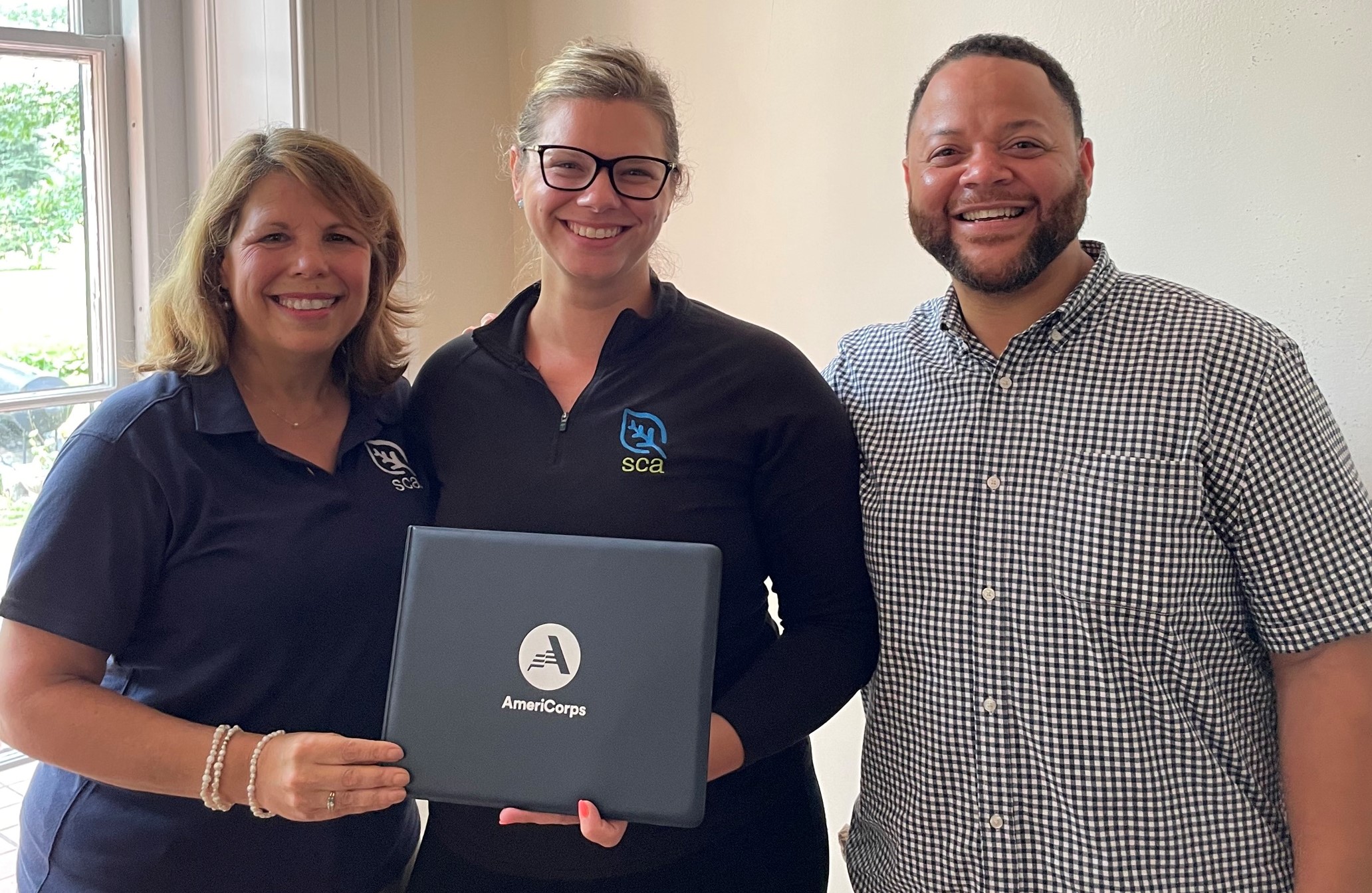 AmeriCorps CEO with PVSA awardee