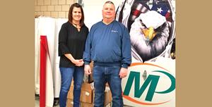 Traci and Jon Eppes own the Minuteman Press design, marketing, and printing franchise in Loves Park, Illinois.