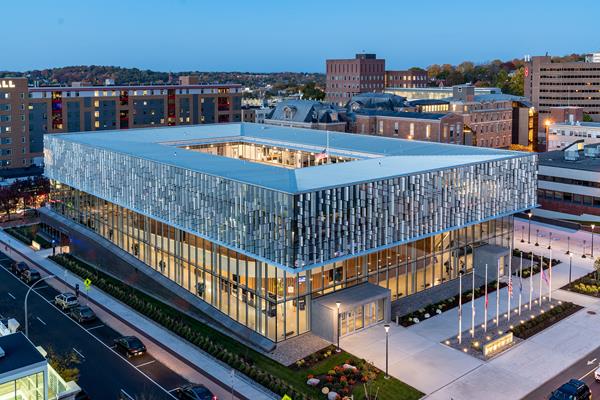 An evening view of The Daniel and Gayle D’Aniello Building, home to the National Veterans Resource Center (NVRC) at Syracuse University.

Credit: Syracuse University 