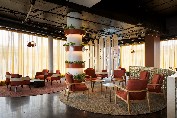 A relaxed, inviting lounge at the Alt Hotel Ottawa Airport, directly connected to the terminal. 