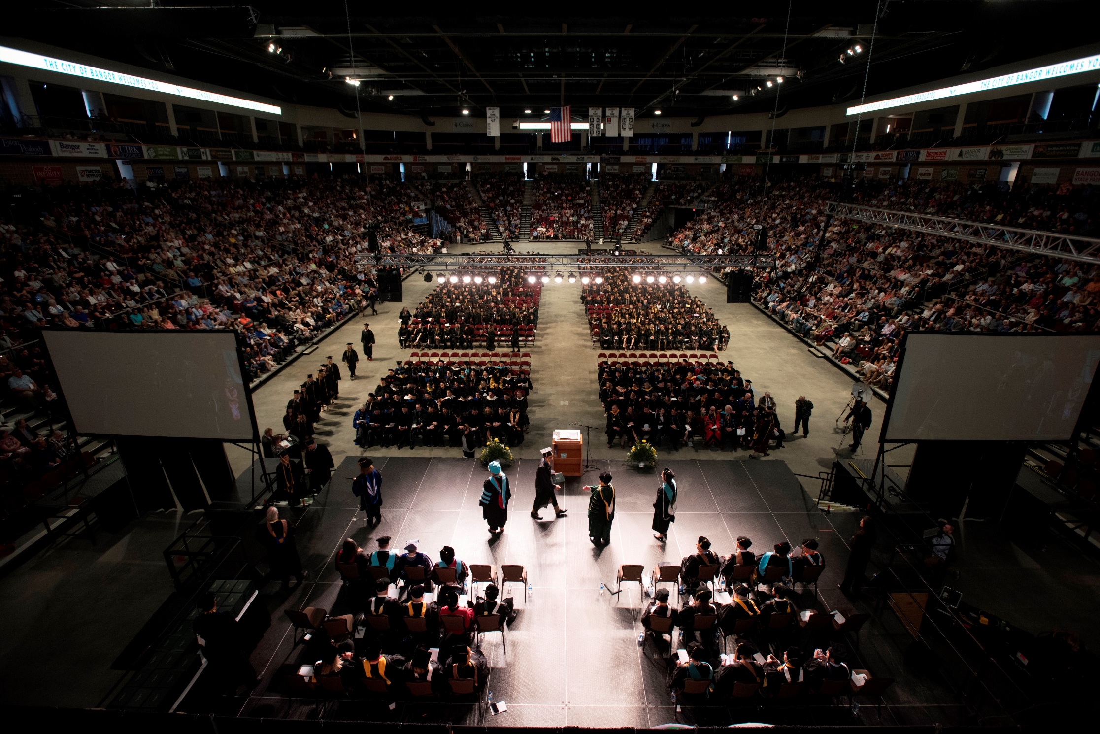 Husson University’s 121st Annual Commencement Exercises, filled with the traditional pomp and circumstance, have been rescheduled for Sunday, October 18, 2020 at 1 p.m. at the Cross Insurance Center due to restrictions on public gatherings in response to the coronavirus pandemic. Similarly, the graduate hooding ceremony for students receiving master’s degrees or doctorates has been rescheduled for Saturday, October 17, 2020 in the Newman Gymnasium. By rescheduling, the University hopes to provide every student with the opportunity to receive the public recognition they deserve for completing their degrees.