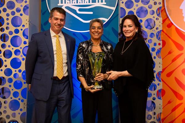From left to right: Chris Loflin, Senior Vice President, Global Corporate Accounts, Ecolab; Roz Mallet, 2019 Thad and Alice Eure Ambassador Award Winner, President & CEO, PhaseNext Hospitality; Van Eure, Owner of Agnus Barn.