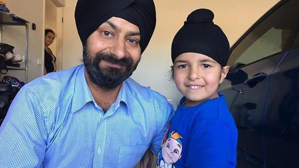 5-year-old Sidhak Singh with his father, Sagardeep Singh Arora