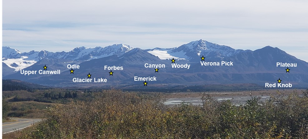 Photograph taken from Richardson Highway looking southeast at various Canwell claim block prospect locations. High-grade massive nickel-copper sulfides enriched in platinum group elements are present at several of these prospects.
