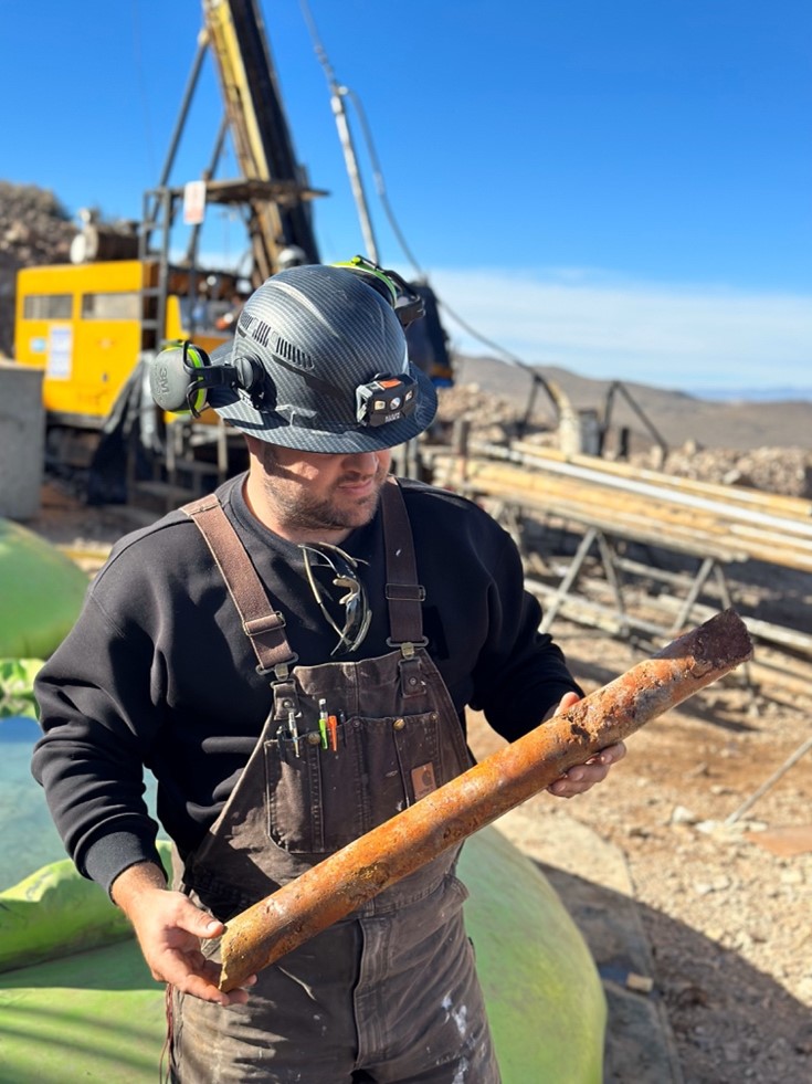 Veta Rica discovery hole drill core being examined by CEO James Rogers.